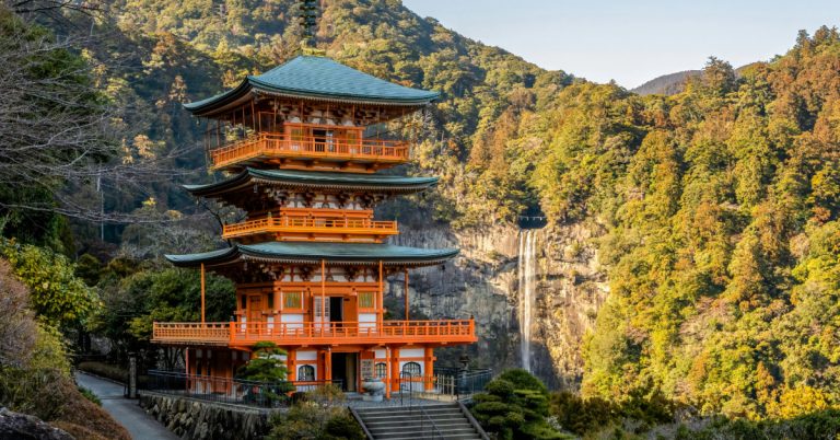 This is the wonderful three-storied pagoda of Seiganto-ji temple with the Nachi Falls in the background.